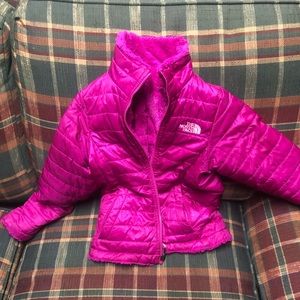 Girls North Face reversible pink jacket